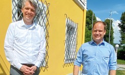 LINZ AG-VD Siligan mit Caritas Infrastr.leiter Glasner