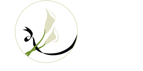 Ein rundes Symbol mit zwei weißen Callas und einer schwarzen Schleife